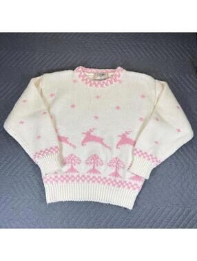 Vintage knit sweater with pink motif details.